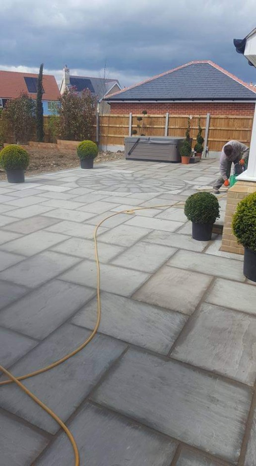 Garden patio with grey slabs