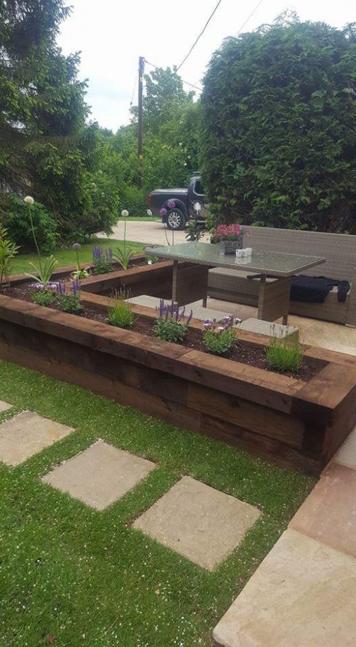 Garden wooden flowerbed